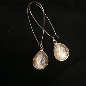 gold teardrop dangle earrings with a stone